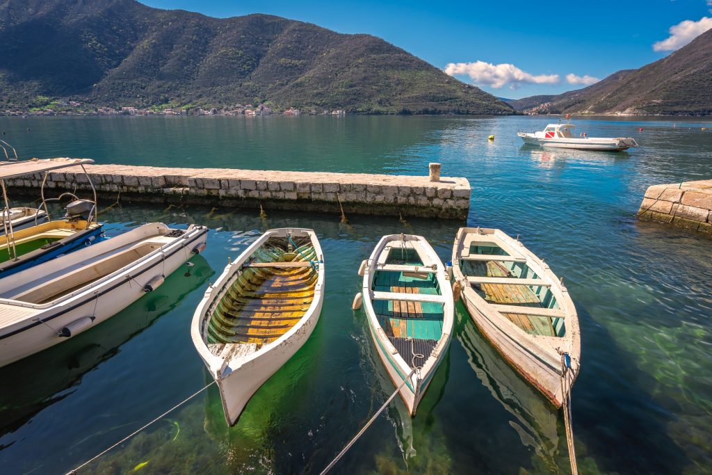 three-small-fishing-boats-in-a-kotor-bay-XR5YT3G_resize