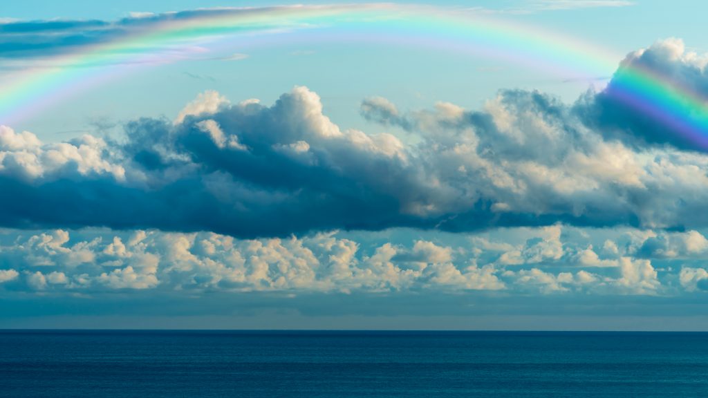 beautiful-sea-with-a-rainbow-in-the-sky-2022-01-28-07-44-26-utc