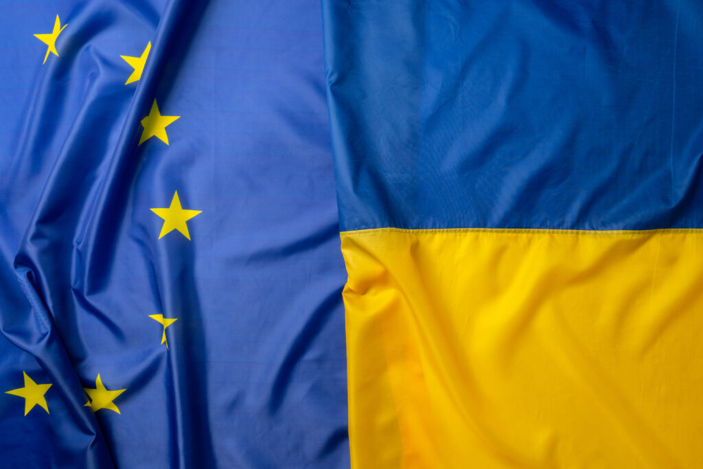 Flags of Ukraine and European Union folded together
