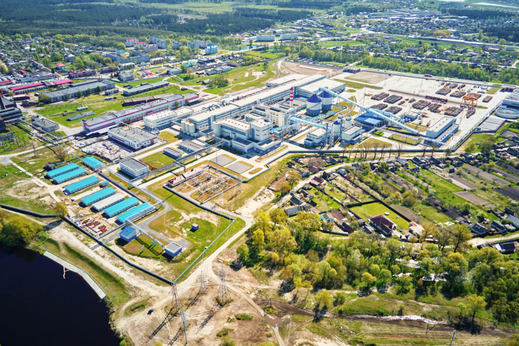 Aerial view of modern paper factory in the city